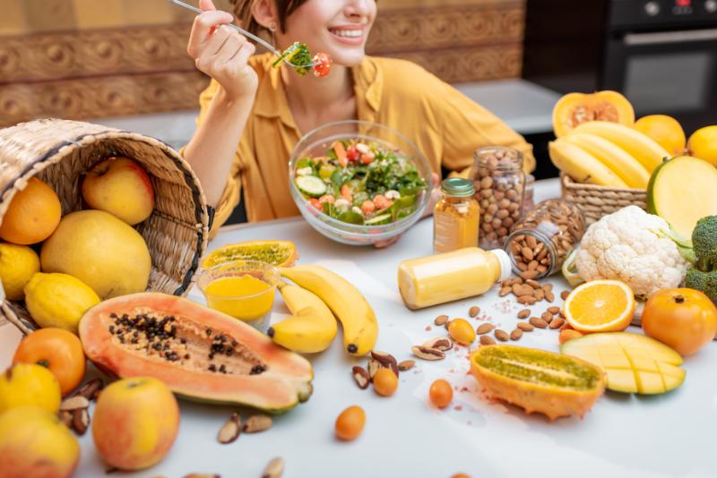 Young woman eating healthy foods